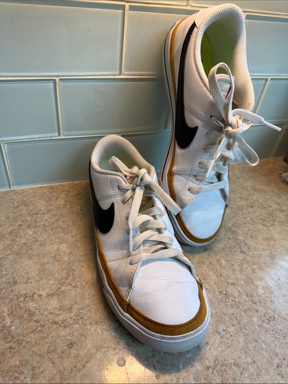 Nike vintage White Low-Top Sneakers with Black Swoosh and Mustard Accent